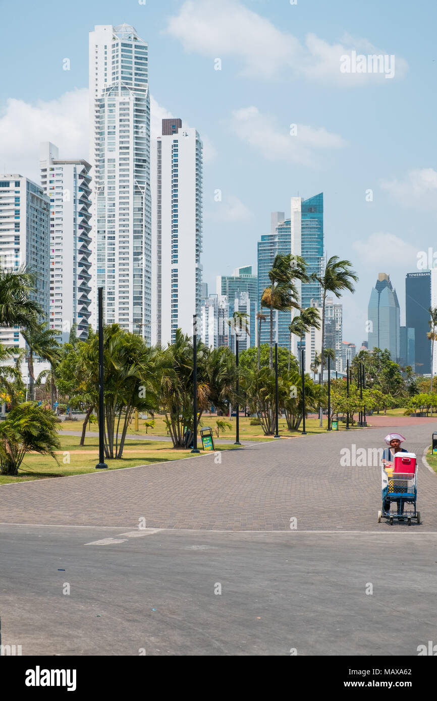 Panama City, Panama - march 2018: Beverage vendor in public park with city skyline at coast promenade in Panama City Stock Photo