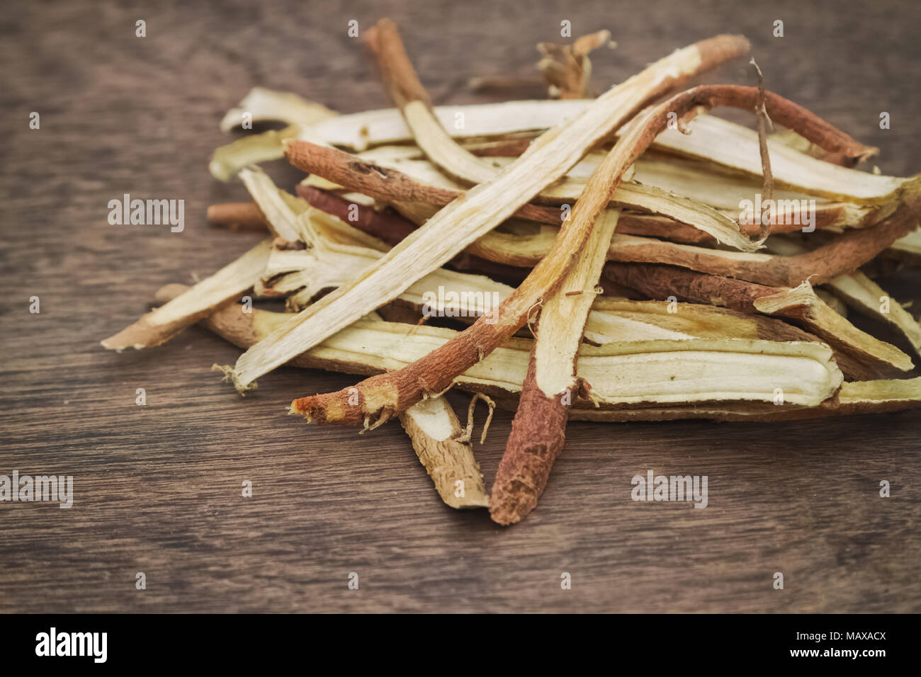 Liquorice root baked used in chinese herbal medicine Stock Photo Alamy