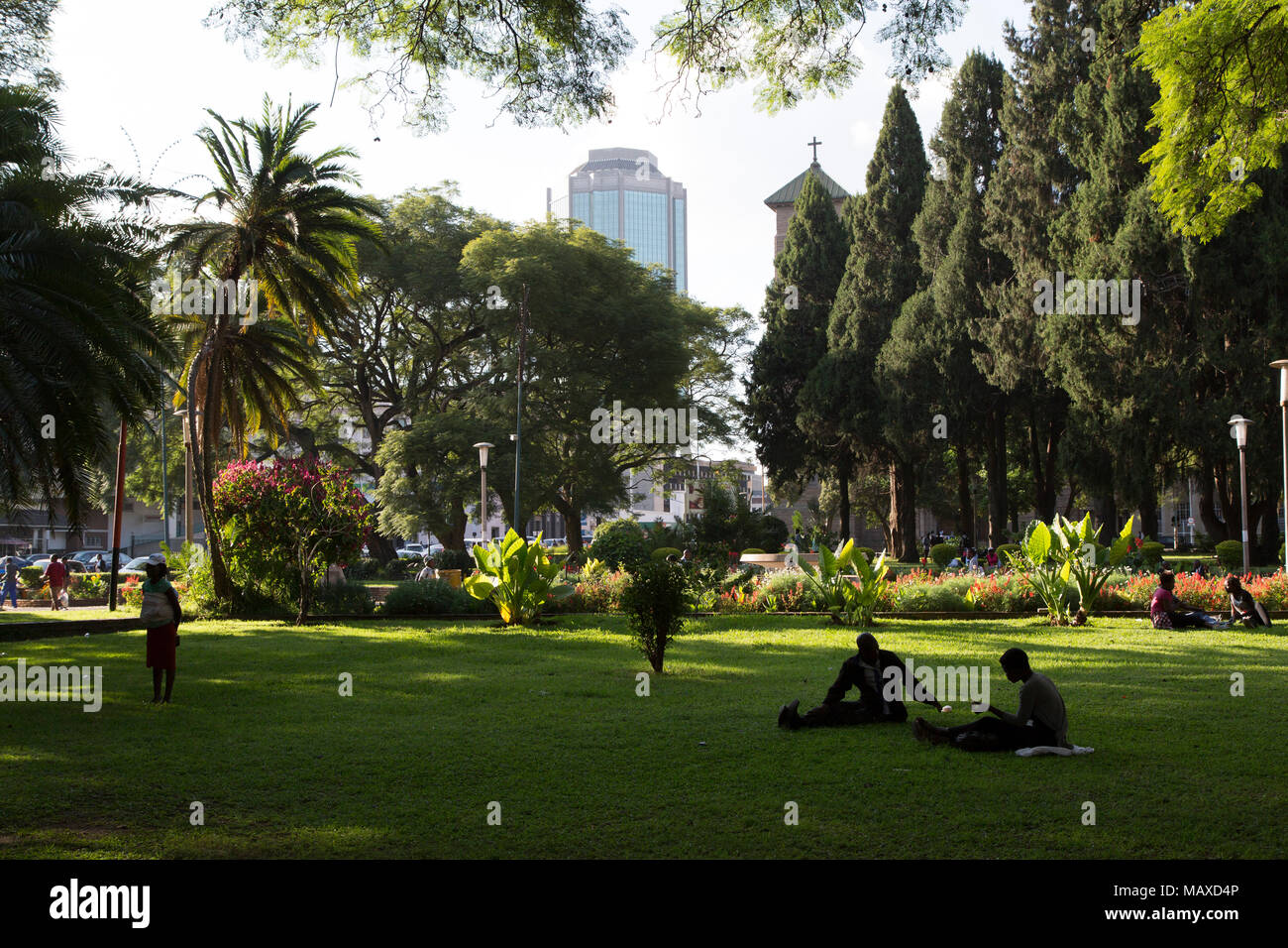 People relaxing at Africa Unity Square in Harare, Zimbabwe. Stock Photo