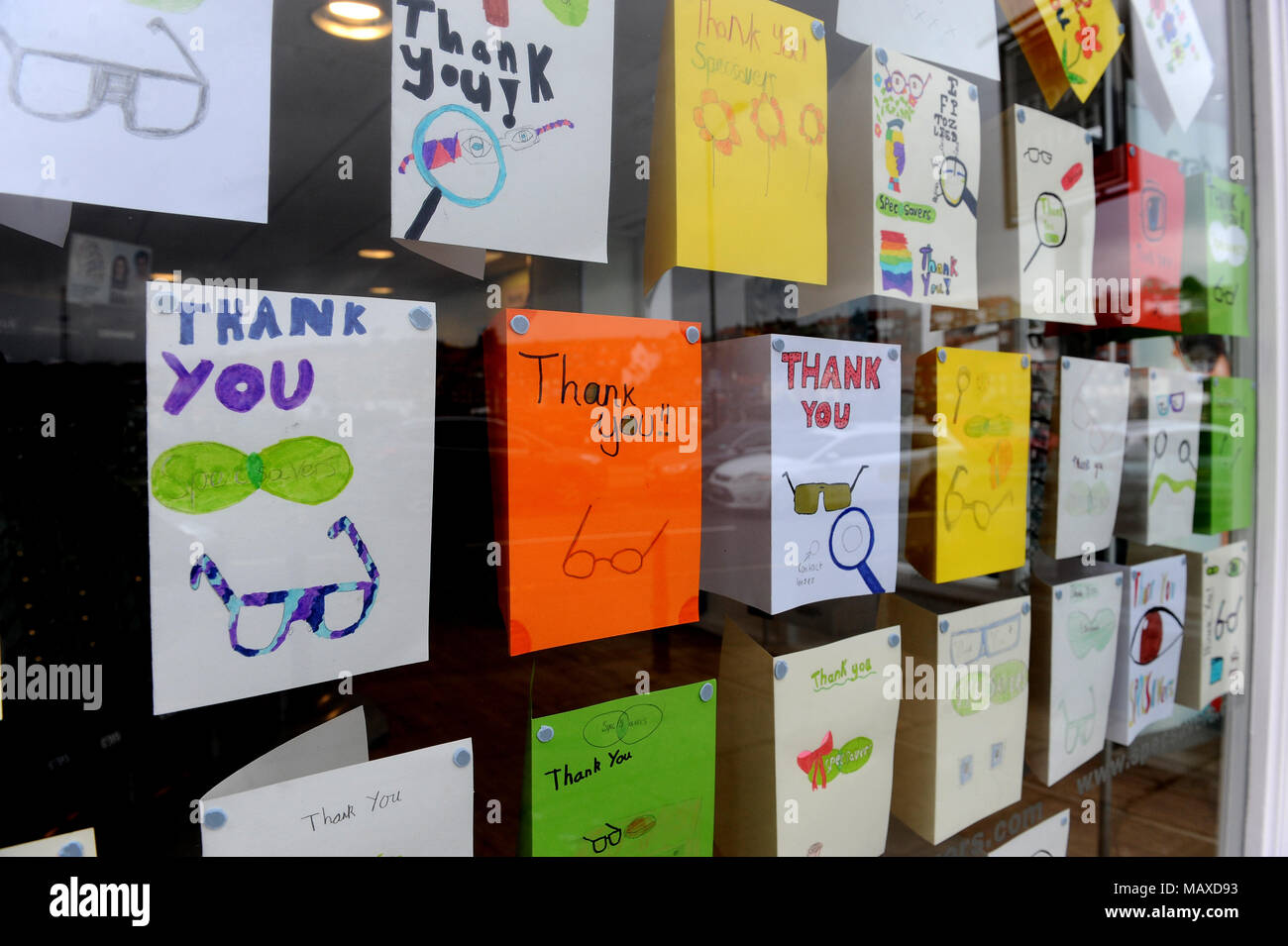 Thank you cards in Specsavers opticians window display in Whitby, North Yorkshire Stock Photo