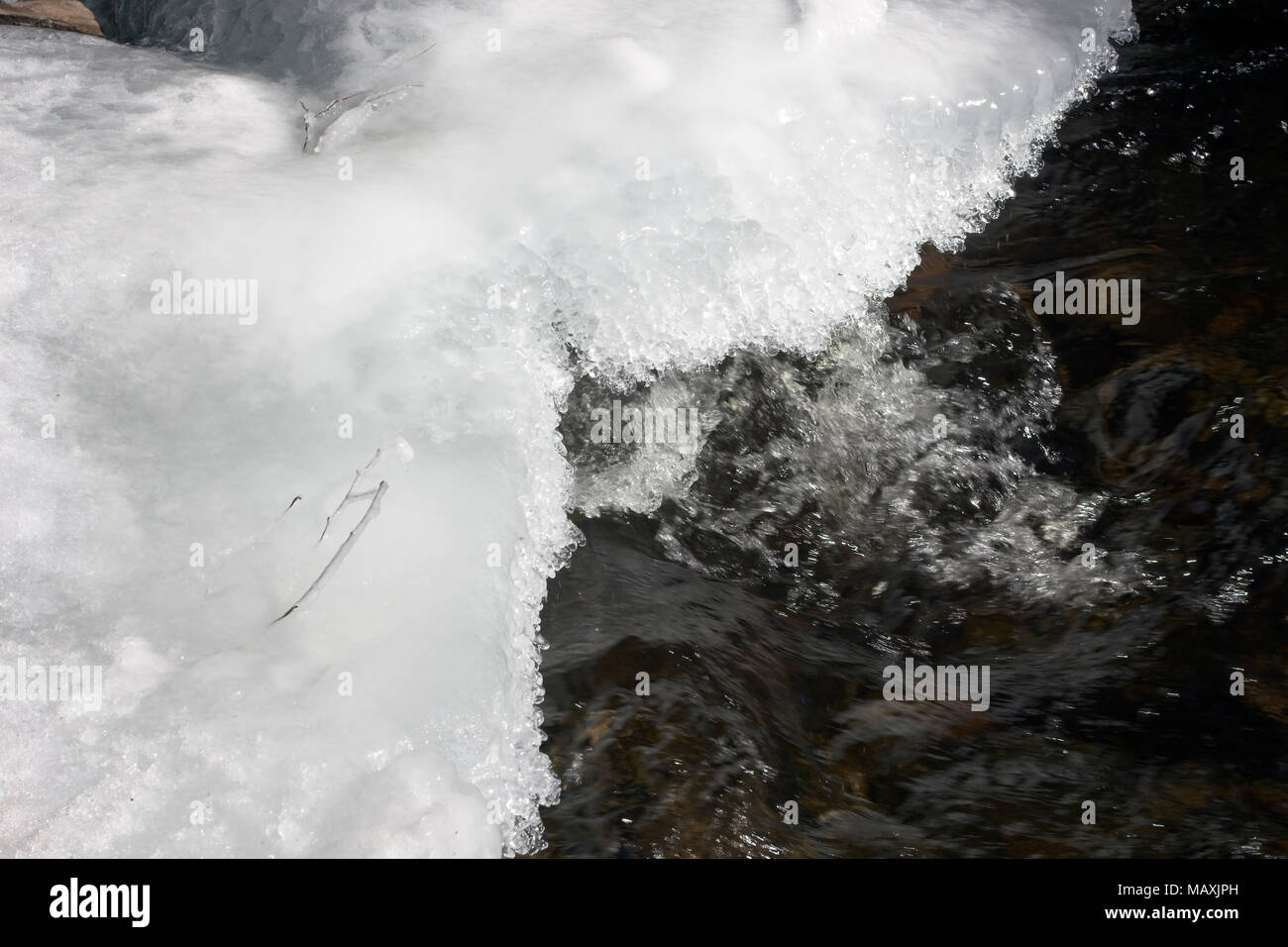 Ice and flowing river, Finland Stock Photo