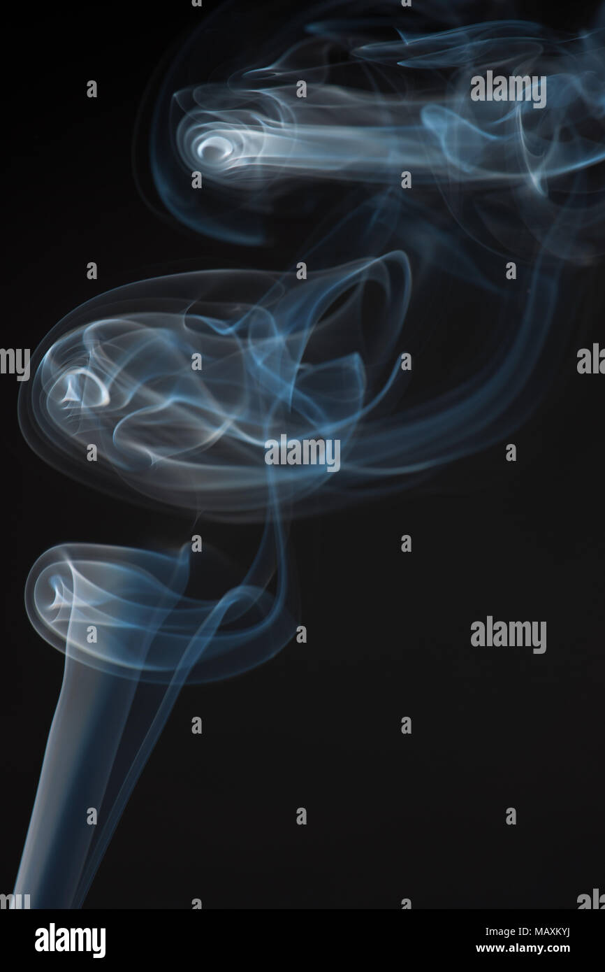 movement of smoke, Abstract Light blue smoke on black background, Light ...