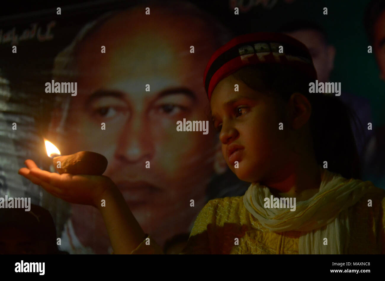 Pakistani workers of Peoples' Party (PPP) are offering dua for Shaheed Zulfiqar Ali Bhutto on the occasion of his martyrdom 39th death anniversary at Chairing Cross. in Lahore on April 03, 2018. Zulfikar Ali Bhutto I (5 January 1928 - 4 April 1979) was a Pakistani politician who served as Prime Minister of Pakistan from 1973 to 1977, and prior to that as the fourth President of Pakistan from 1971 to 1973. He is revered by his followers in Pakistan as Quaid-i-Awam He was also the founder of the Pakistan People's Party (PPP) and served as its chairman until his execution in 1979. (Photo by Rana Stock Photo