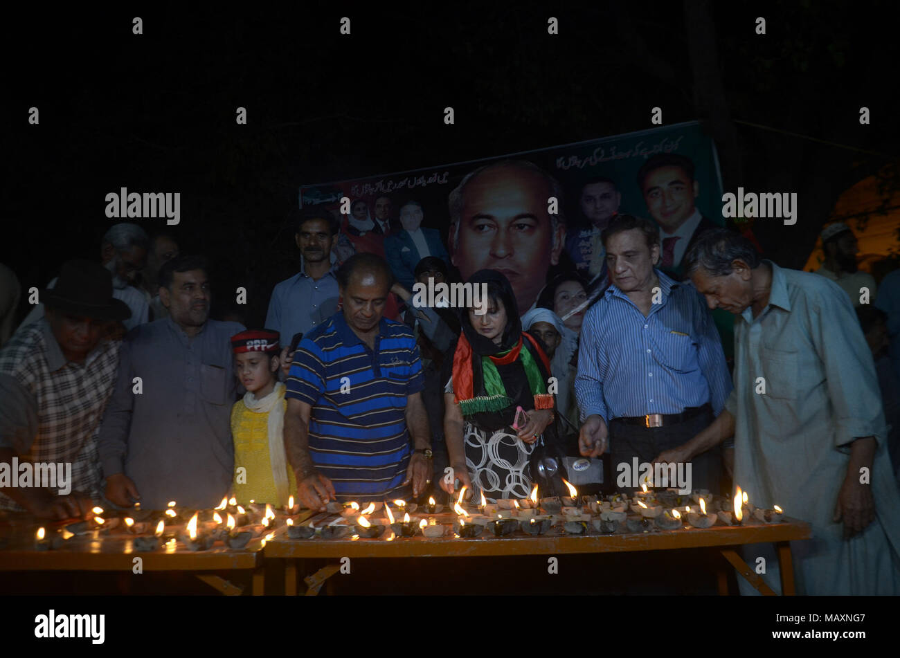 Pakistani workers of Peoples' Party (PPP) are offering dua for Shaheed Zulfiqar Ali Bhutto on the occasion of his martyrdom 39th death anniversary at Chairing Cross. in Lahore on April 03, 2018. Zulfikar Ali Bhutto I (5 January 1928 - 4 April 1979) was a Pakistani politician who served as Prime Minister of Pakistan from 1973 to 1977, and prior to that as the fourth President of Pakistan from 1971 to 1973. He is revered by his followers in Pakistan as Quaid-i-Awam He was also the founder of the Pakistan People's Party (PPP) and served as its chairman until his execution in 1979. (Photo by Rana Stock Photo