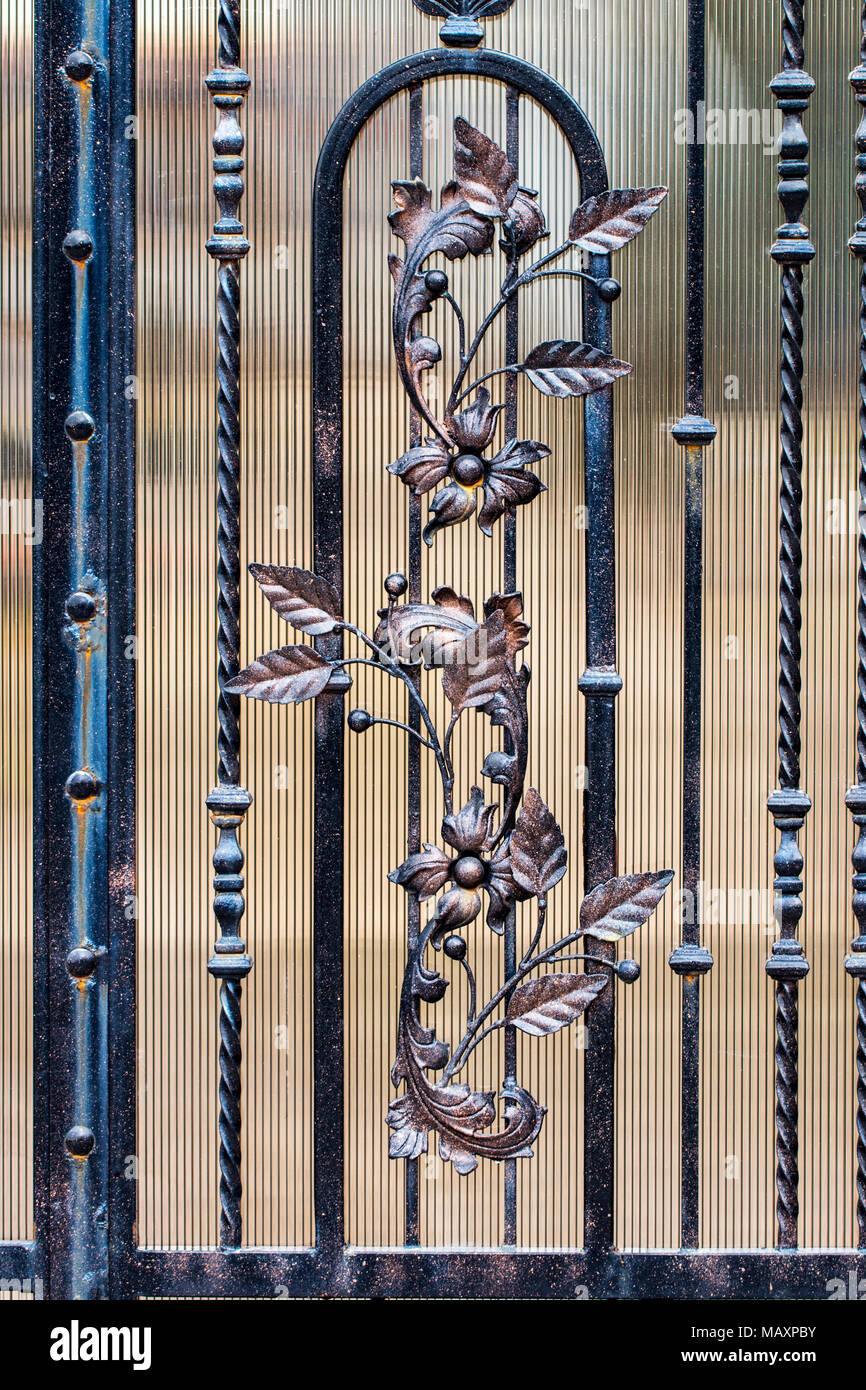 door decoration with ornate wroughtiron elements, close up Stock Photo
