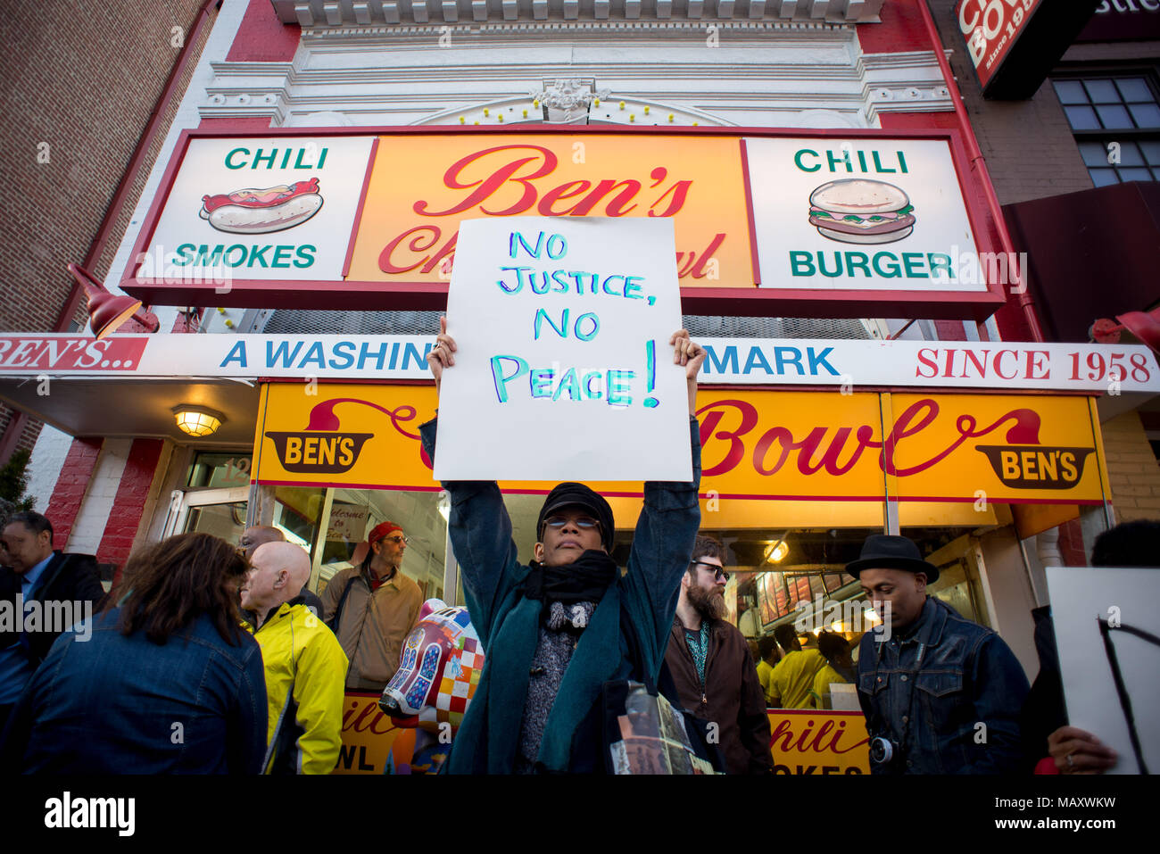 Washington, District of Columbia, USA. 4th Apr, 2018. Activists gather at Ben's Chili Bowl to commemorate the 50th anniversary of Dr. Martin Luther King Jr.'s assassination. On this date in 1968, police allowed the historic restaurant to remain open during rioting so that organizers and residents could meet and eat. Credit: Erin Scott/ZUMA Wire/Alamy Live News Stock Photo