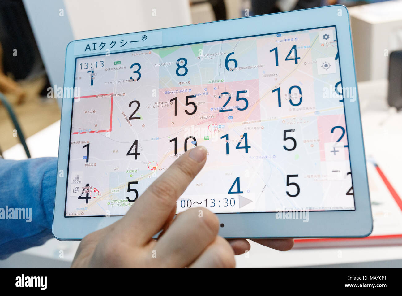 Tokyo Japan April 5 18 An Exhibitor Shows A Forecasting Taxi Demand In Real Time System Ai Taxi Developed By Ntt Docomo During The 2nd Ai Expo At Tokyo Big Sight On