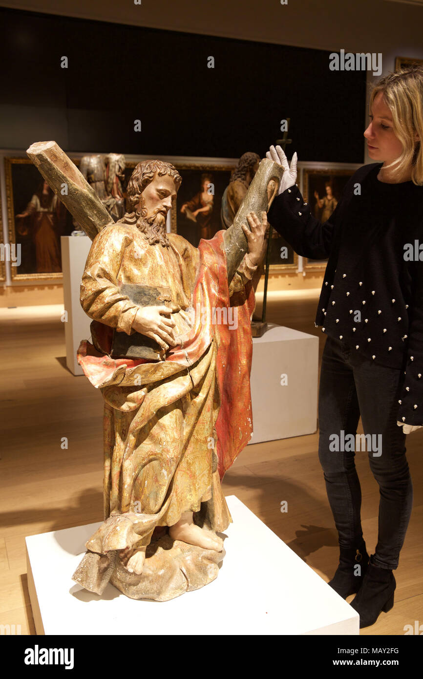 London,UK,5th April 2018,A Photocall took place at Bonhams of a private art collection from Spanish Master Sculptor Antón Casamor. Highlights include: A LARGE 17TH CENTURY POLYCHROME AND GILTWOOD FIGURE OF ST. ANDREW Estimated at £ 3,000 - 5,000. The sale takes place on the 11th April 2018.Credit Keith Larby/Alamy Live News Stock Photo
