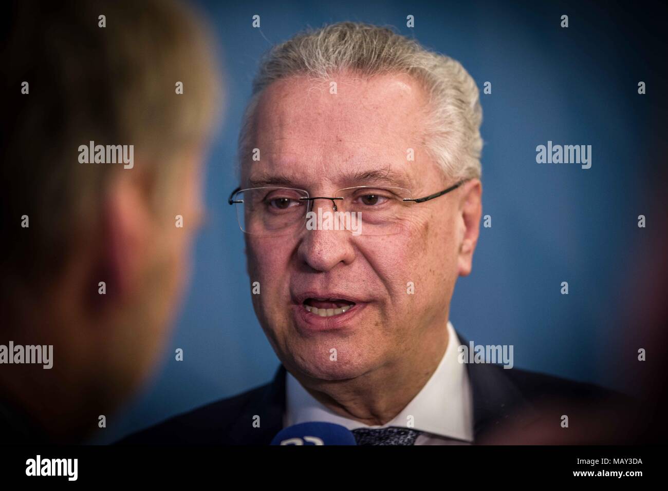 Munich, Bavaria, Germany. 5th Apr, 2018. Joachim Herrmann, Interior Minister of Bavaria. The 2017-2018 edition of the Bavarian Verfassungsschutzbericht (Office for the Protection of the Constitution, Secret Service) report was released detailing threats to the state of Bavaria, including right- and left-extremism, Islamists, as well as Cyber Warfare and Espionage. The report introduced by Bavarian Innenminister Joachim Herrmann (CSU) and Dr. Burkhard KÃ¶rner, as well as .In recent years, Bavaria has seen a sharp rise in what is known as PMK-Rechts (politically motivated crimes- right wing) Stock Photo