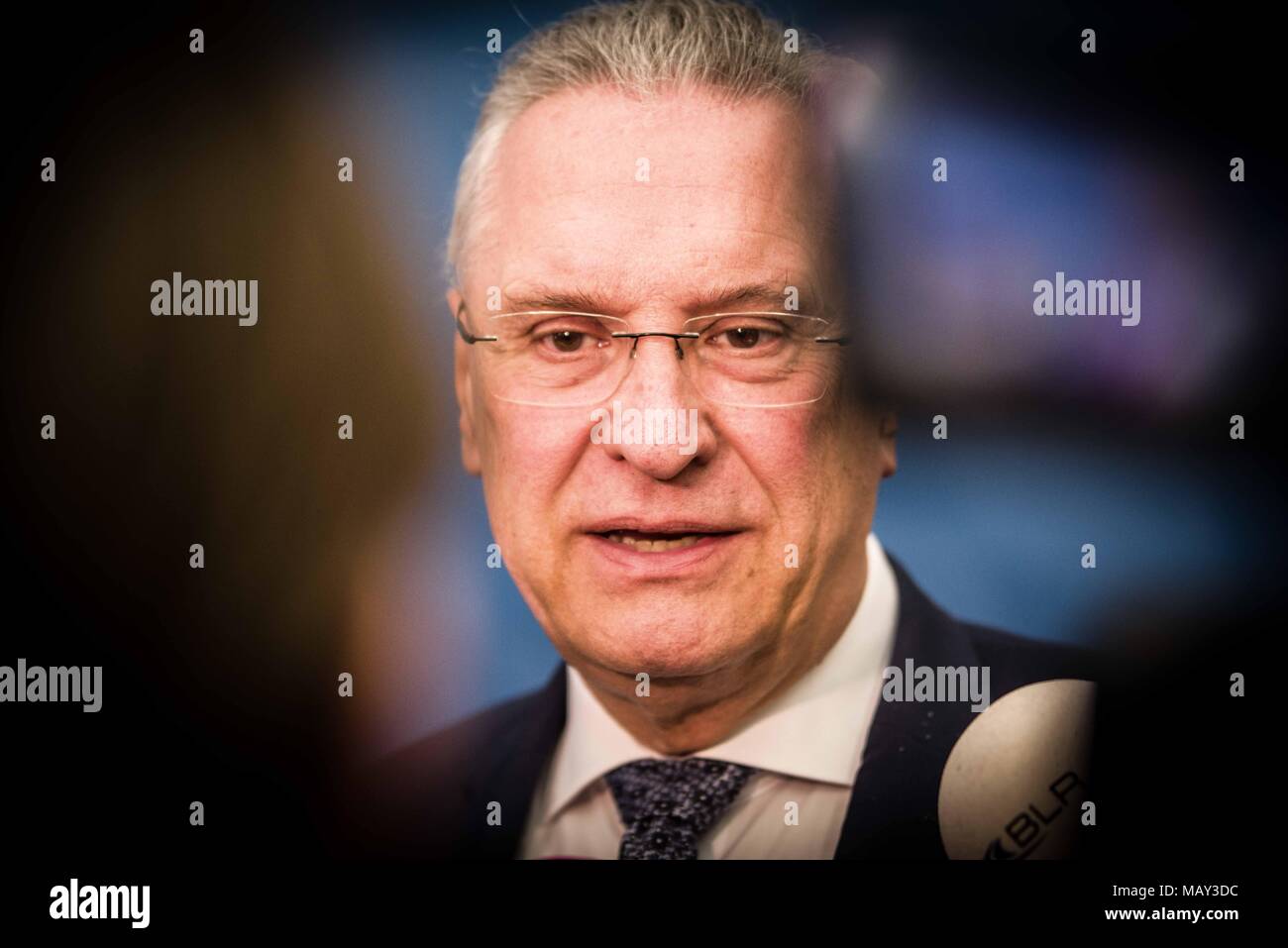 Munich, Bavaria, Germany. 5th Apr, 2018. Joachim Herrmann, Interior Minister of Bavaria. The 2017-2018 edition of the Bavarian Verfassungsschutzbericht (Office for the Protection of the Constitution, Secret Service) report was released detailing threats to the state of Bavaria, including right- and left-extremism, Islamists, as well as Cyber Warfare and Espionage. The report introduced by Bavarian Innenminister Joachim Herrmann (CSU) and Dr. Burkhard KÃ¶rner, as well as .In recent years, Bavaria has seen a sharp rise in what is known as PMK-Rechts (politically motivated crimes- right wing) Stock Photo