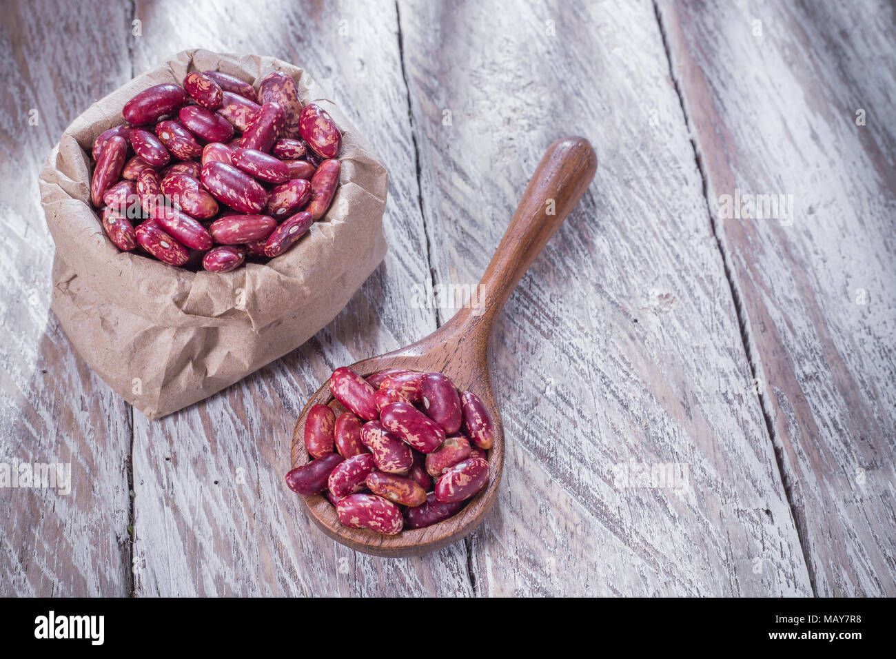 red bean and vegetable oil on wood Stock Photo Alamy