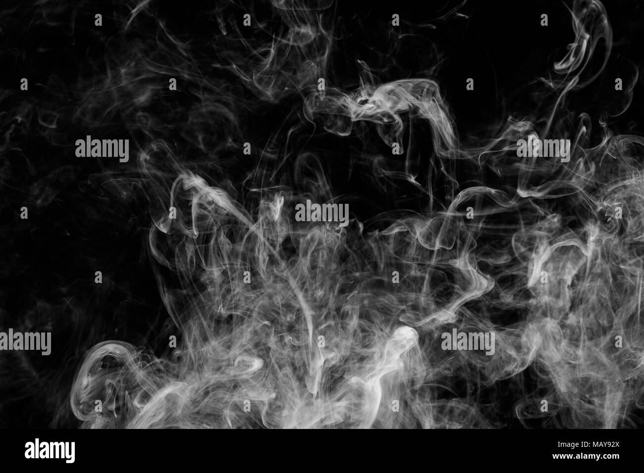 White cloud smoke on black isolated background Stock Photo - Alamy