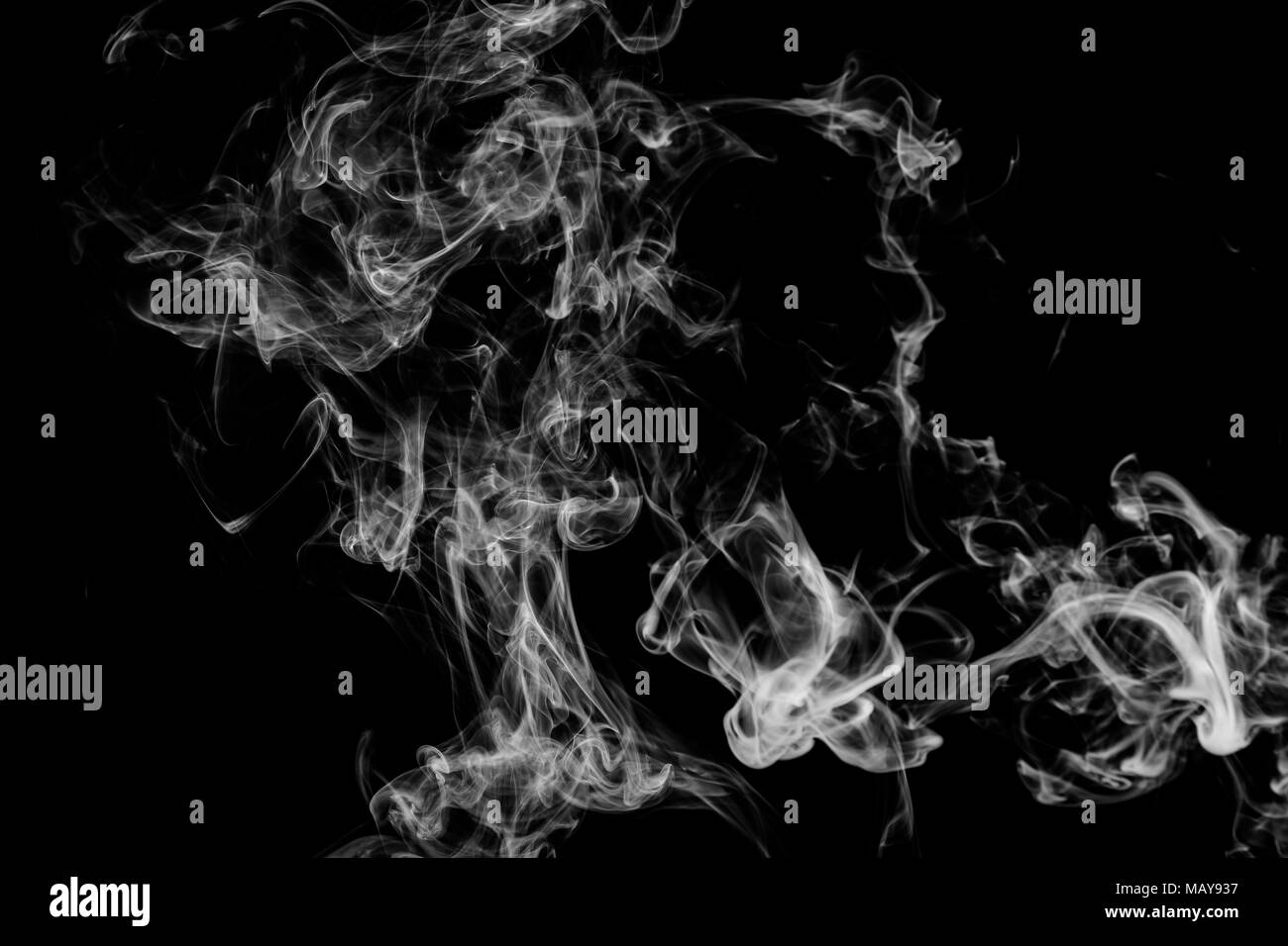 White cloud smoke on black isolated background Stock Photo - Alamy