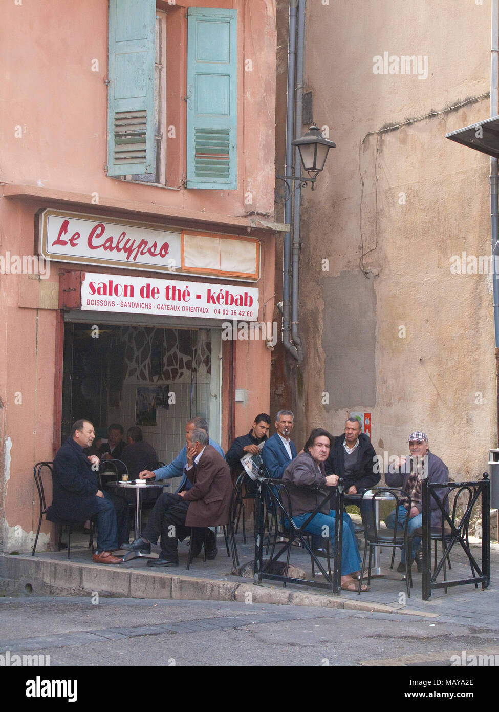 Men at bar at old town of Grasse, Alpes-Maritimes, South France, France, Europe Stock Photo