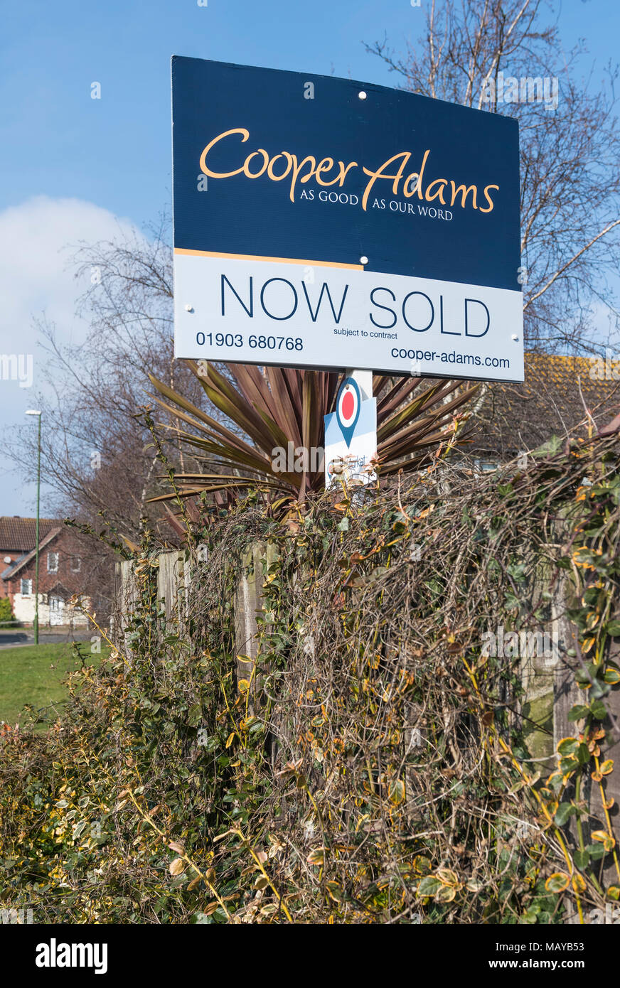 House now sold sign from Cooper Adams estate agents in England, UK. Stock Photo