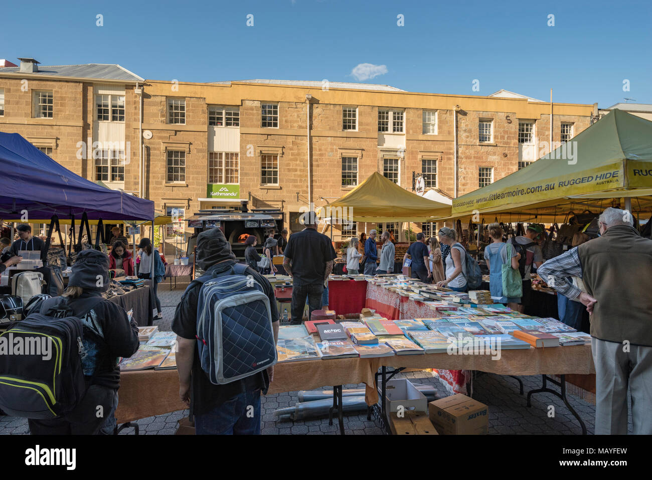 Salamanca Market with stalls in front of the old waterfront sandstone buildings in Hobart, Tasmania Stock Photo