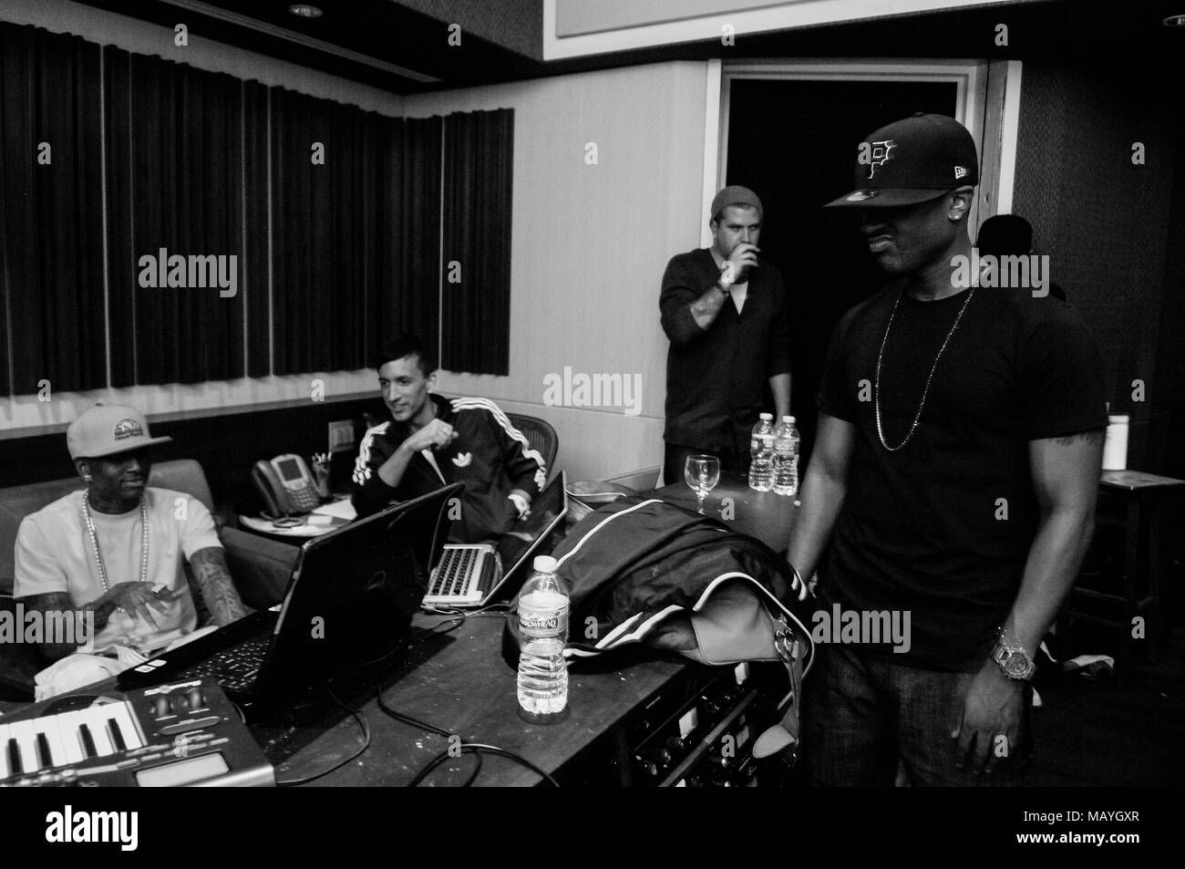 Deandre Way aka Soulja Boy, Clinton Sparks and Ray J at a recording studio on March 22, 2010 in Los Angeles, California. Stock Photo