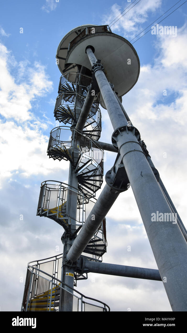 A Spiral staircase leading to the launching point of a death slide on