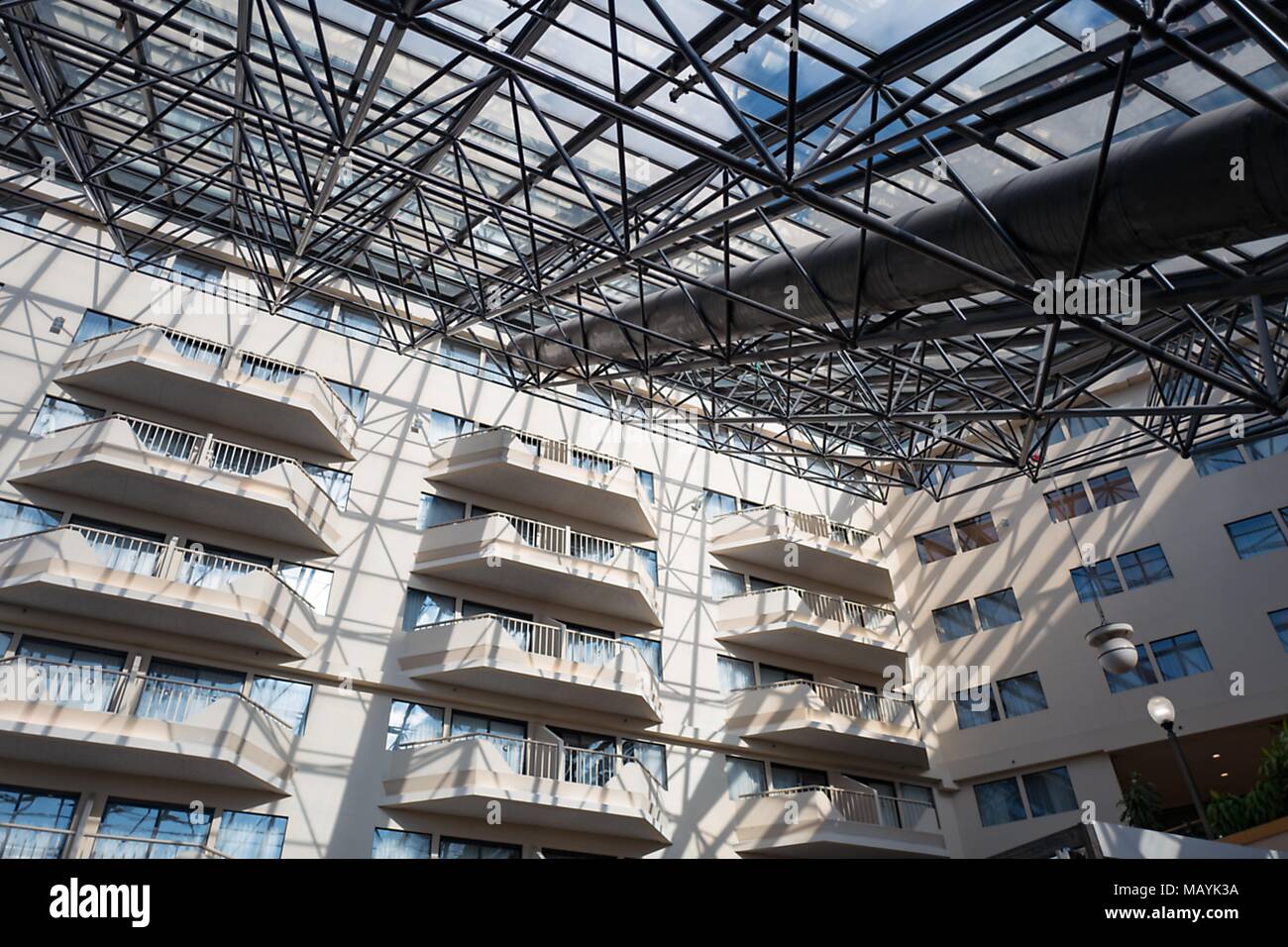 Latticed glass roof and balconies on a sunny day at the Doubletree Newark Airport hotel in Newark, New Jersey, March 16, 2018. () Stock Photo