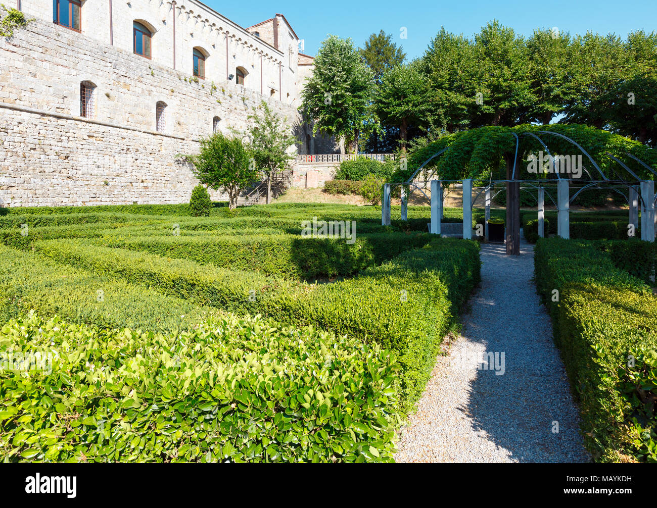 Green garden with geometric shades near Montepulciano Fortezza Medicea (Fortezza Di Montepulciano). Province of Siena, Tuscany, Italy. Stock Photo