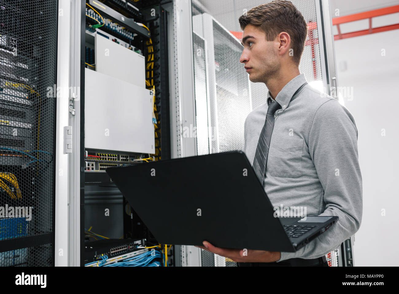 IT expert checking supercomputer server Stock Photo