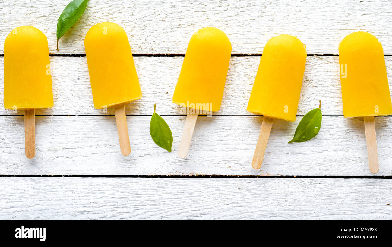 Ice lollies with mango hires stock photography and images Alamy