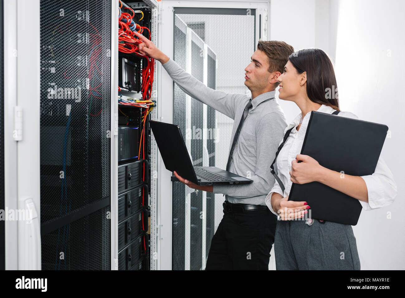 IT expert checking supercomputer server Stock Photo - Alamy