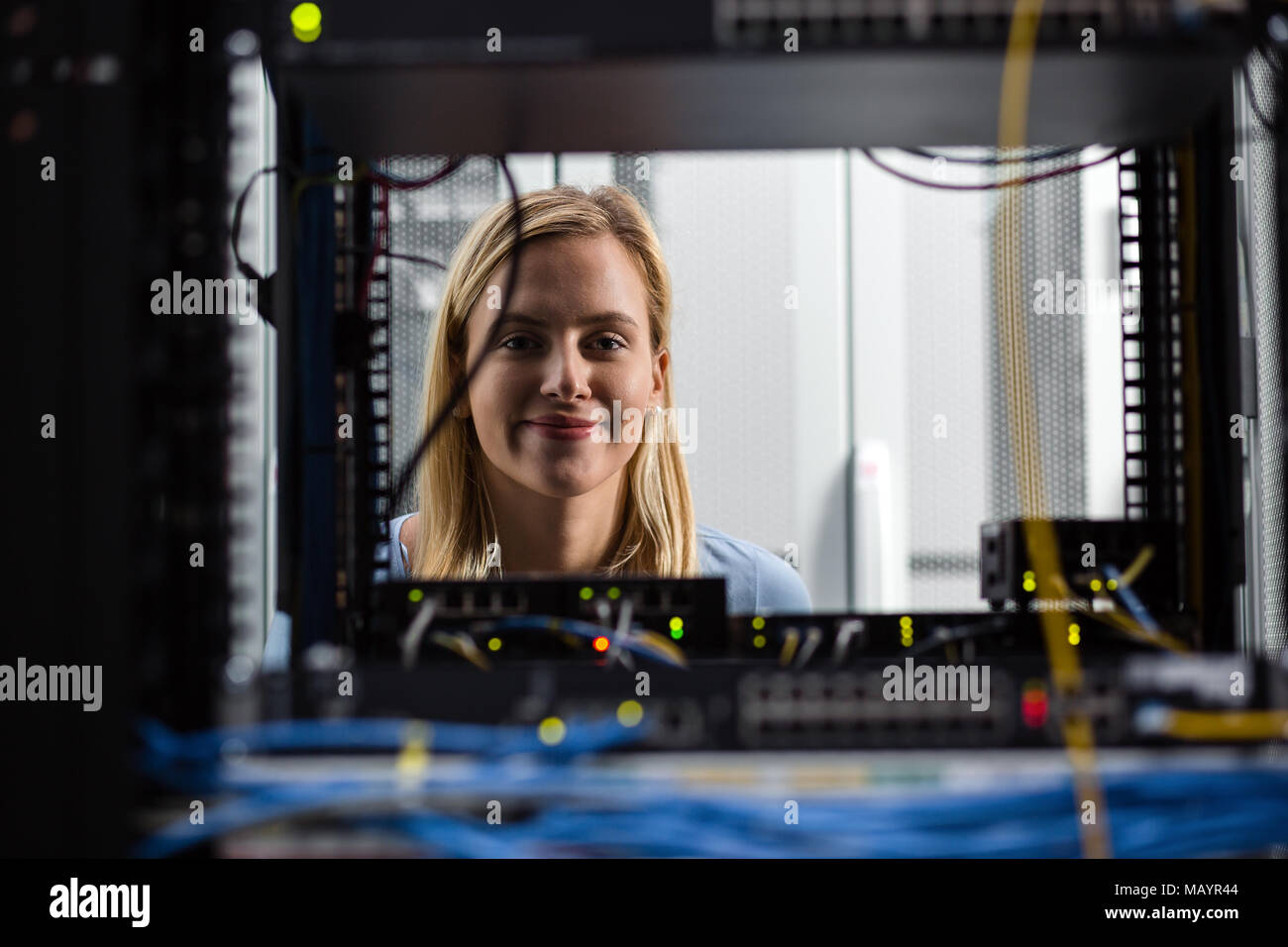 IT expert checking supercomputer server Stock Photo