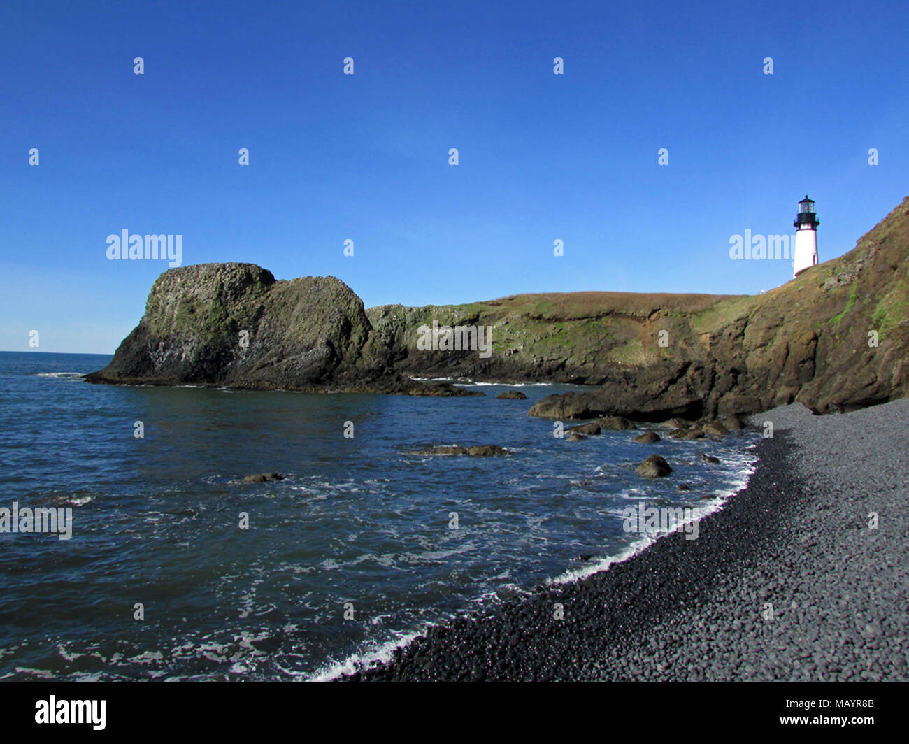 Lighthouse at Yaquina Head in Newport, OR Stock Photo