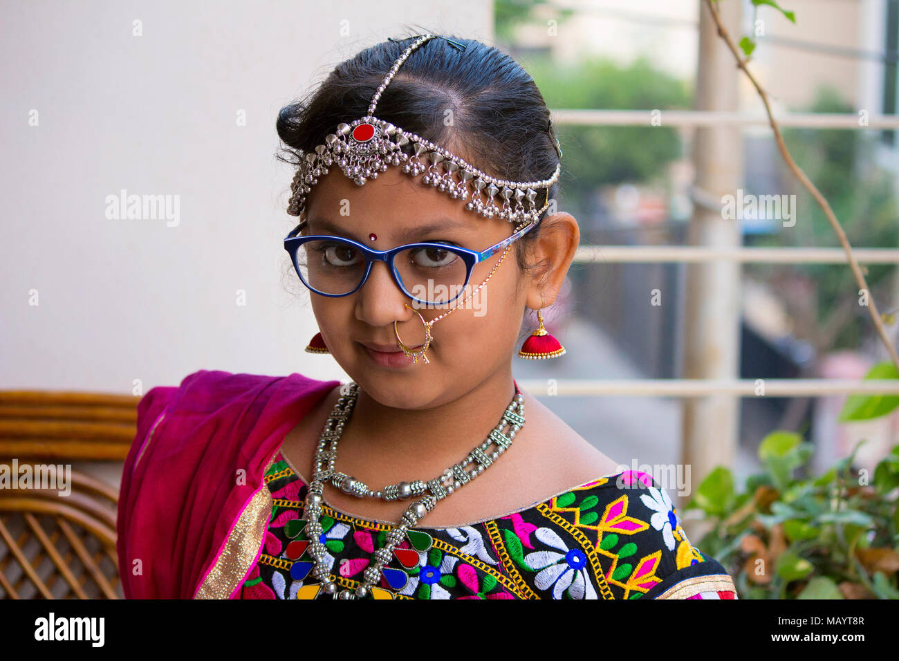 Little cute Girl wear traditional Rajasthani outfit and jewelry Stock Photo
