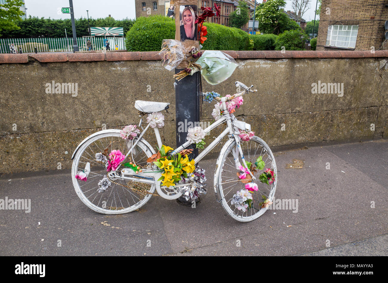 White ghost bicycle roadside memorial at the spot where a cyclist was killed in a traffic accident, Haringey, London, UK Stock Photo