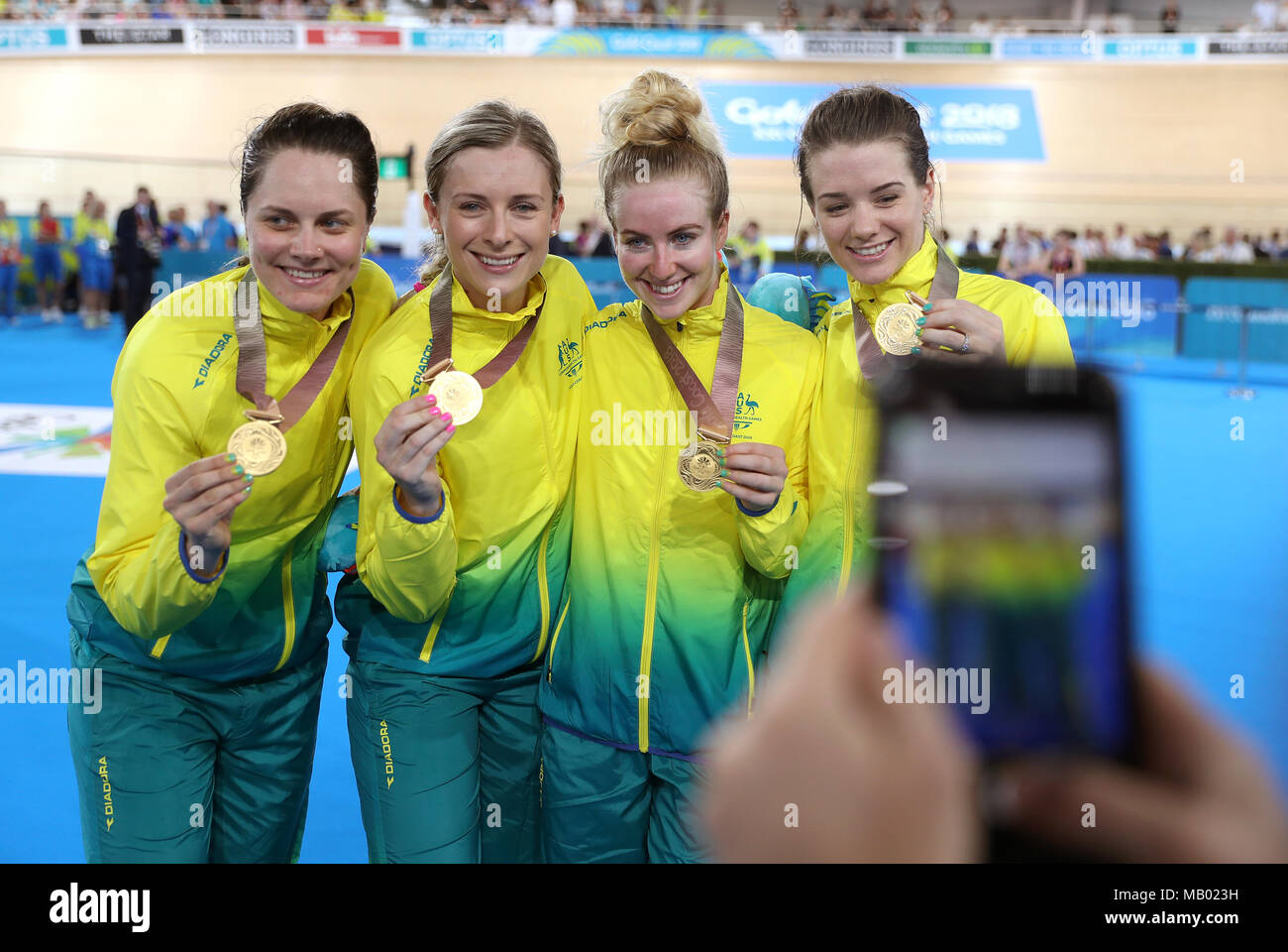 Left to right, Australia's Ashlee Ankudinoff, Annette Edmondson, Alexandra Manly and Amy Cure pose with their medals after winning gold in the Women's 4000m Team Pursuit Finals at the Anna Meares Velodrome during day one of the 2018 Commonwealth Games in the Gold Coast, Australia. Stock Photo