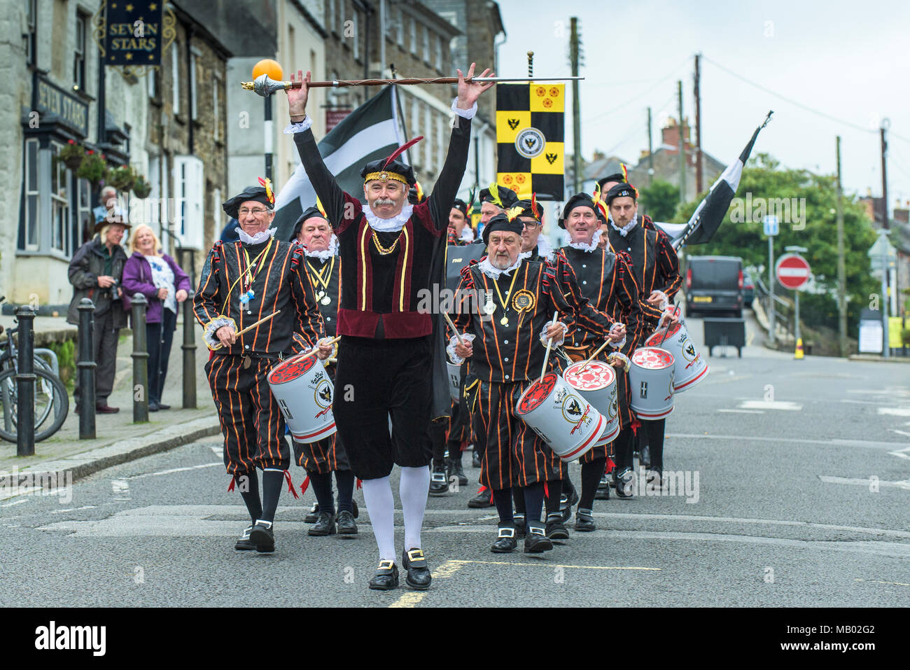 The Falmouth Marine Band marching through the streets of Penryn Cornwall as part of the Penryn Kemeneth two day heritage festiva. Stock Photo