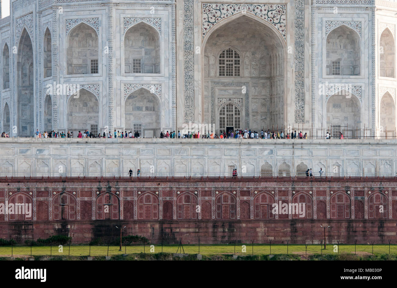 Agra, India - March 15 2017: Famous marble palace of Taj Mahal, dedicated to love, with tourists around, in Agra city, india Stock Photo