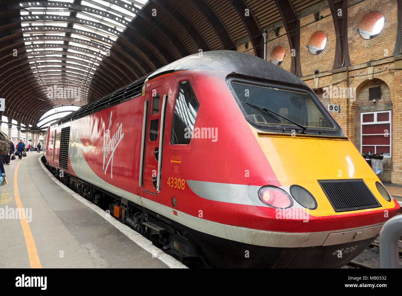 Virgin Trains high speed passenger train waiting at the station. Stock Photo