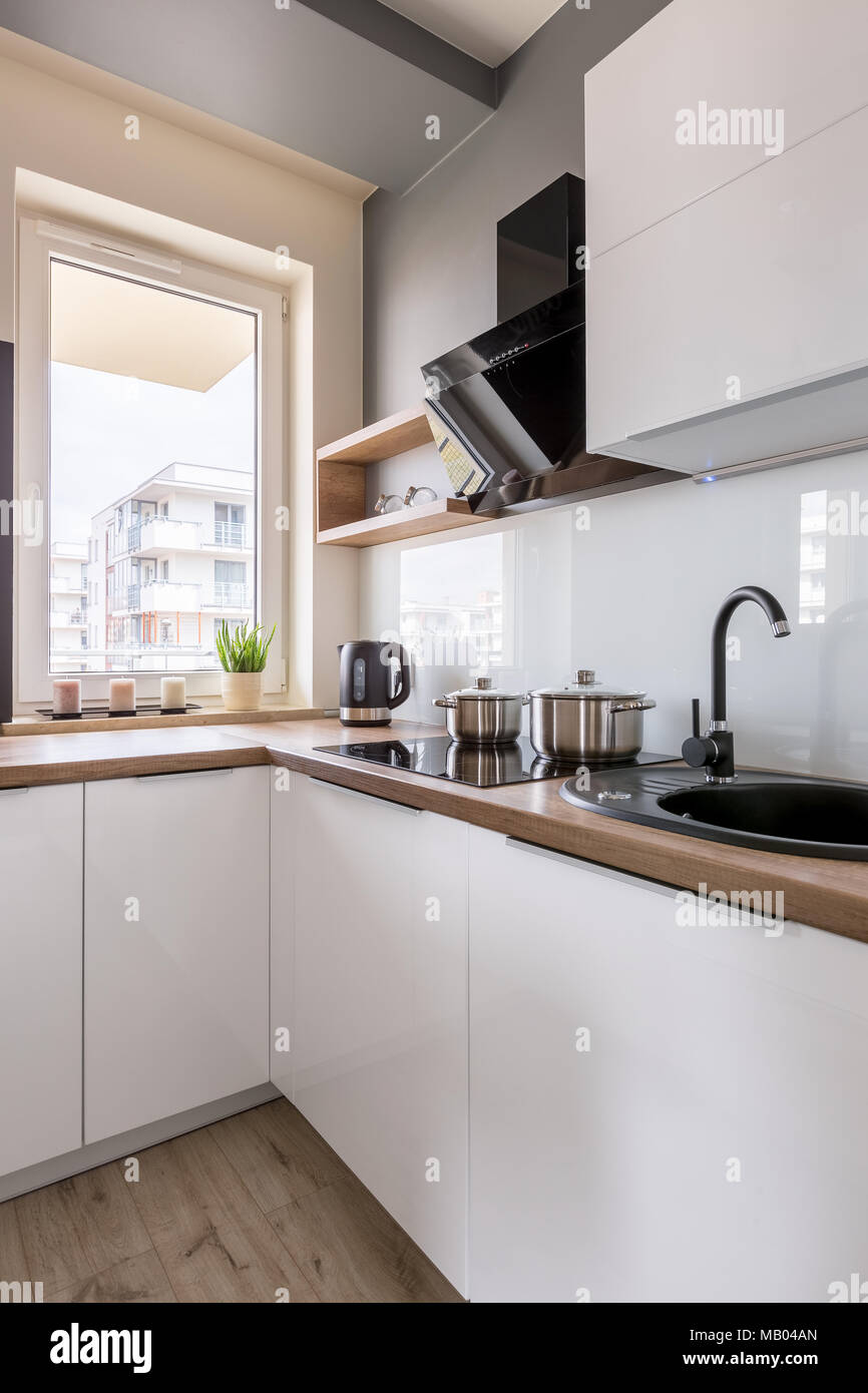White cabinets black sink deals
