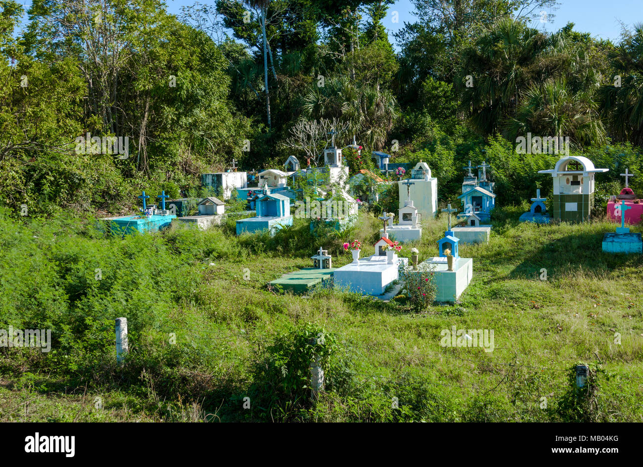 Local cemetery custom with colorful markers at the Cruise destination Costa Maya Mexico America is a popular stop on the Western Caribbean cruise ship Stock Photo