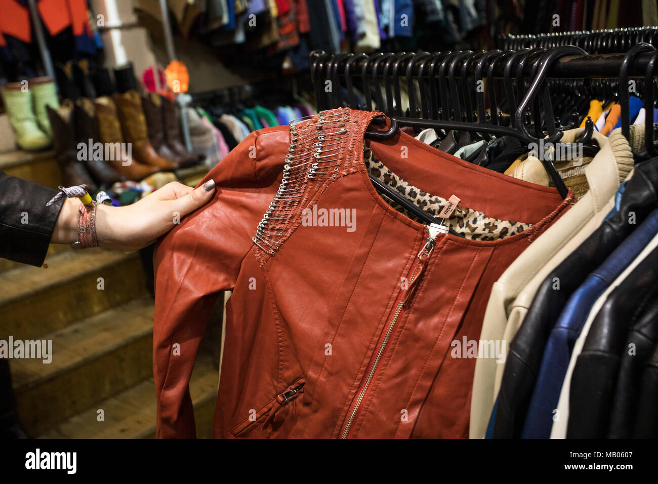 Vintage shopping in London red leather jacket. Stock Photo