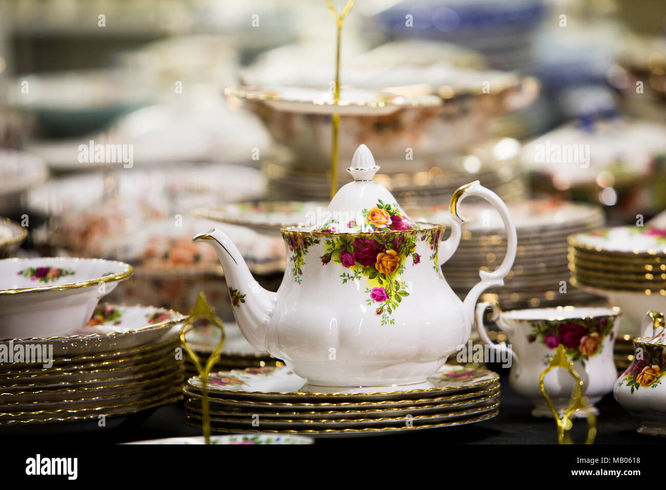 Vintage china and crockery - Royal Doulton teapot and cake set on sale. Stock Photo