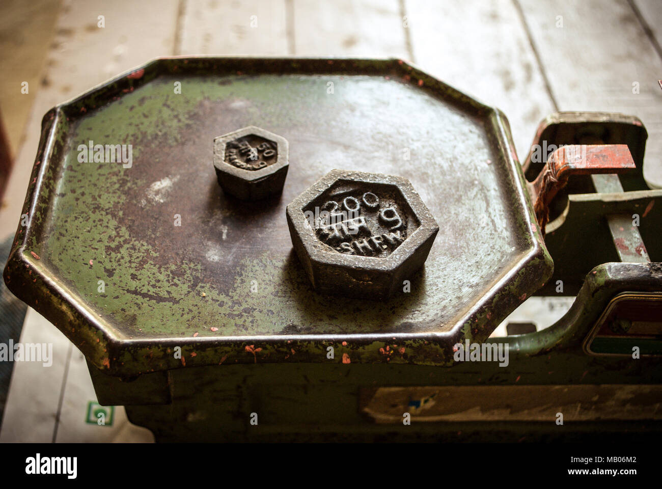 weighing iron weight Stock Photo Alamy