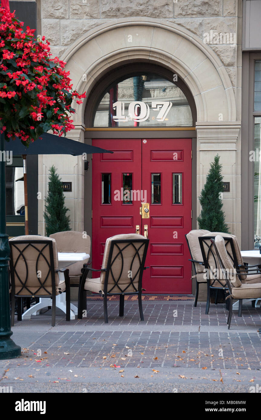 Empty sidewalk patio outside of a restaurant on Stephen Avenue in downtown Calgary, Alberta