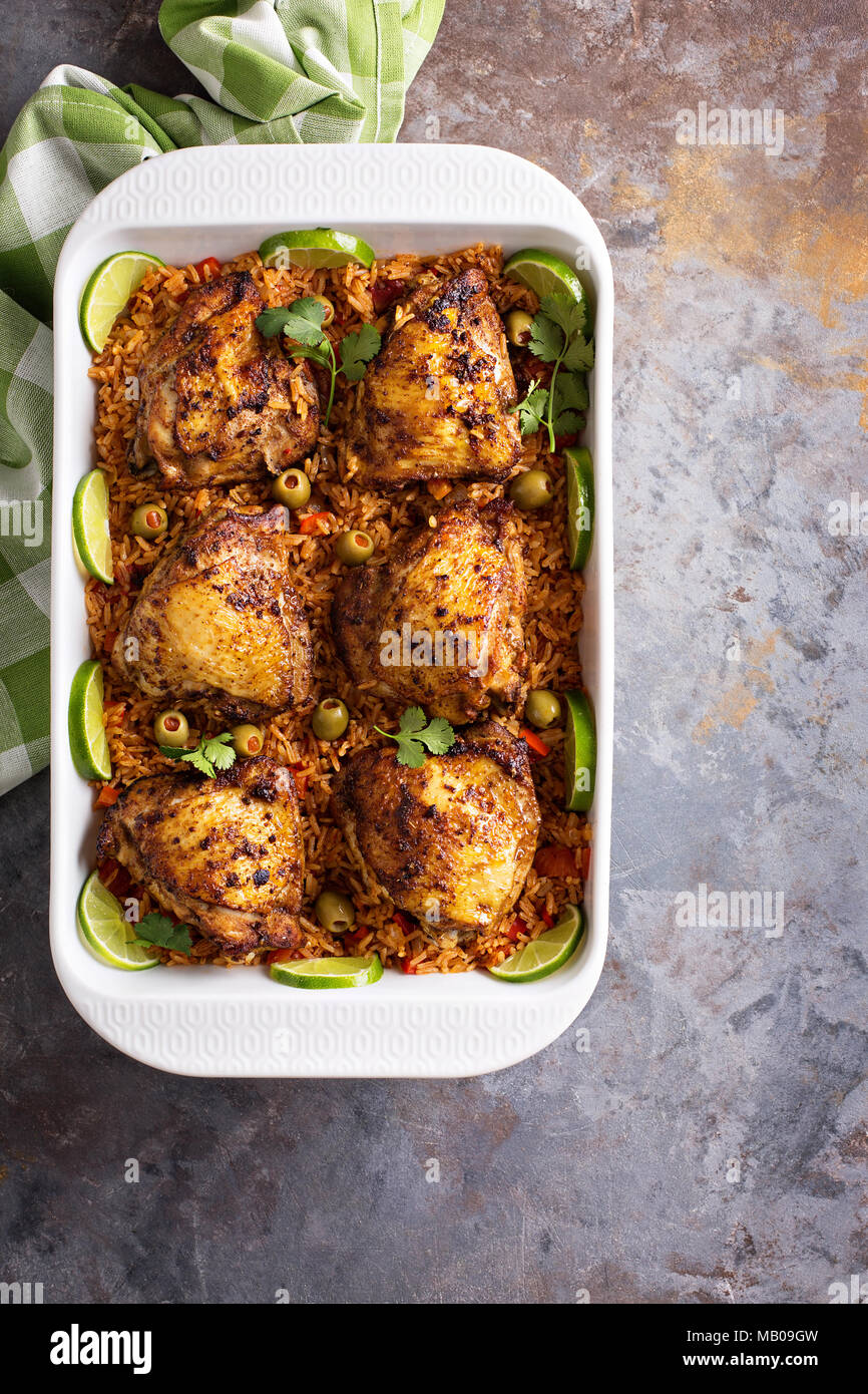 Arroz con Pollo, seared chicken with spanish rice and olives Stock Photo