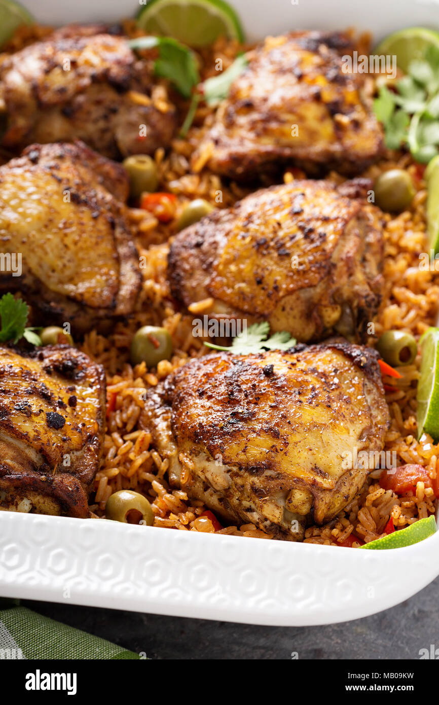 Arroz con Pollo, seared chicken with spanish rice and olives Stock Photo
