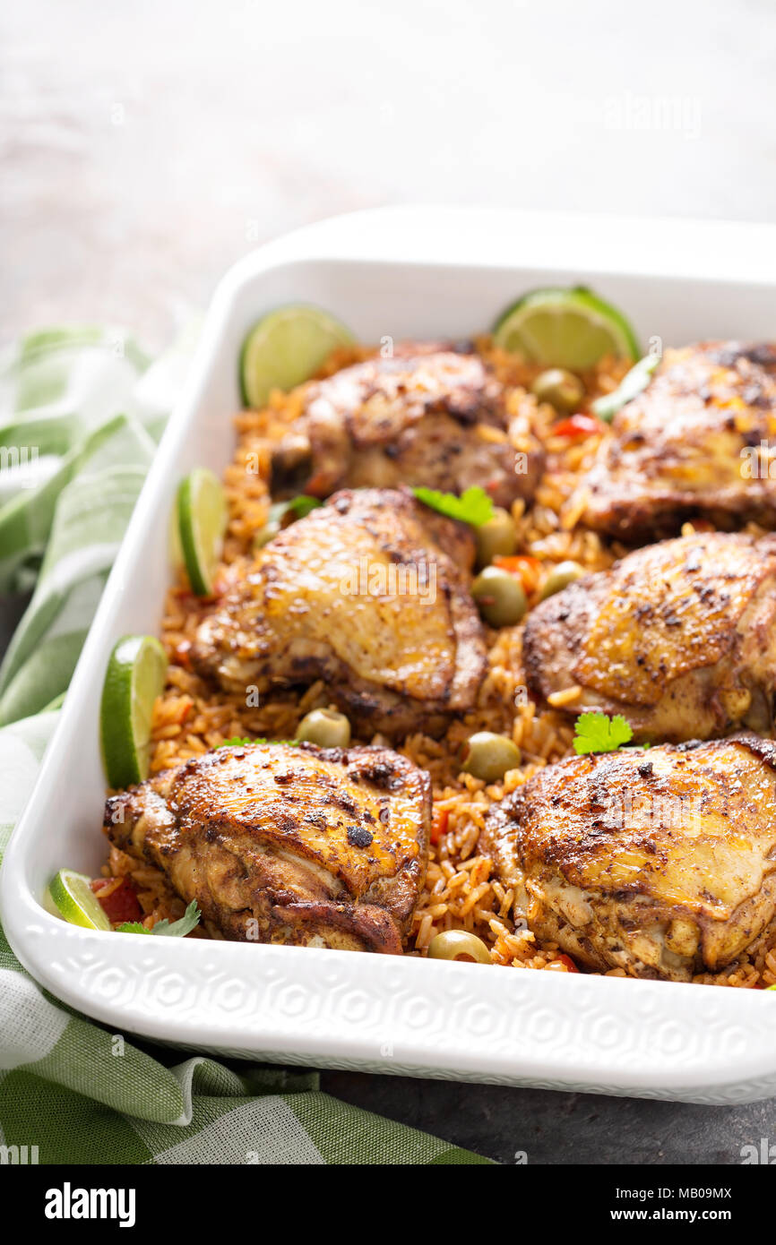 Arroz con Pollo, seared chicken with spanish rice and olives Stock Photo