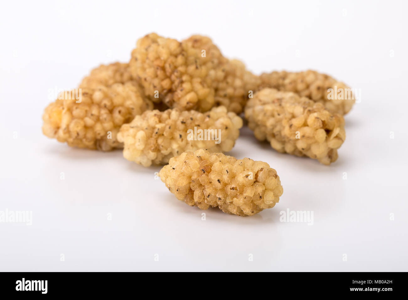 Close Up Shot Of Dried White Mulberries Fruits Isolated On White Background, A Healthy And Popular Sweet Snacks In Iran And Turkey Stock Photo