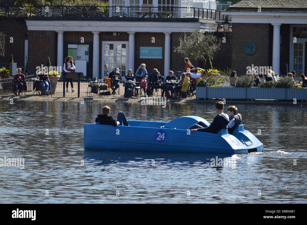 In a paddle boat on the serpentine in hyde park hires stock