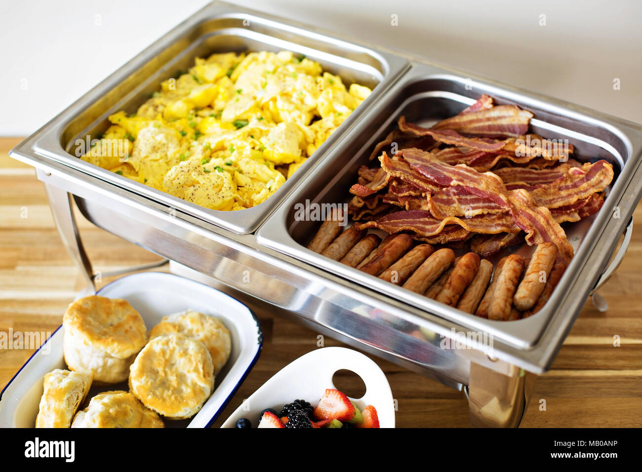 Breakfast buffet with scrambled eggs, sausage and bacon Stock Photo Alamy