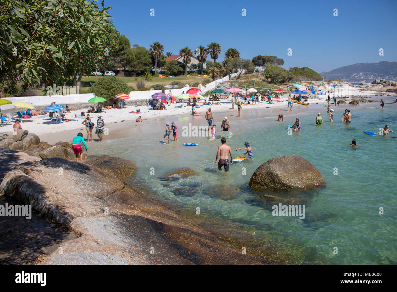 Beautiful sunny day at the beach in South Africa. Cape Town beaches are stunning and have the most amazing water, so blue that even hurt the eyes! Stock Photo