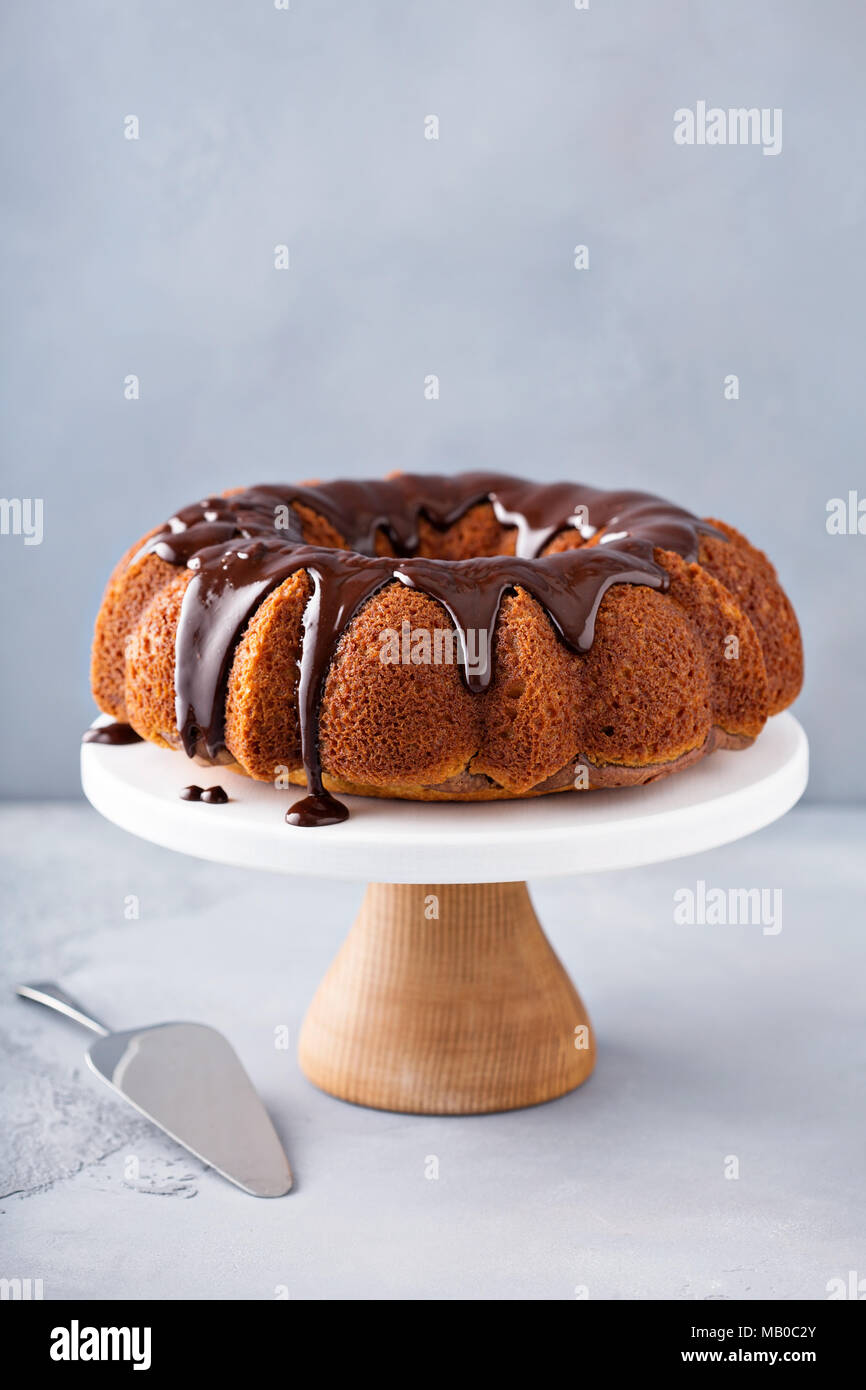Vanilla bundt cake with chocolate glaze on top Stock Photo Alamy