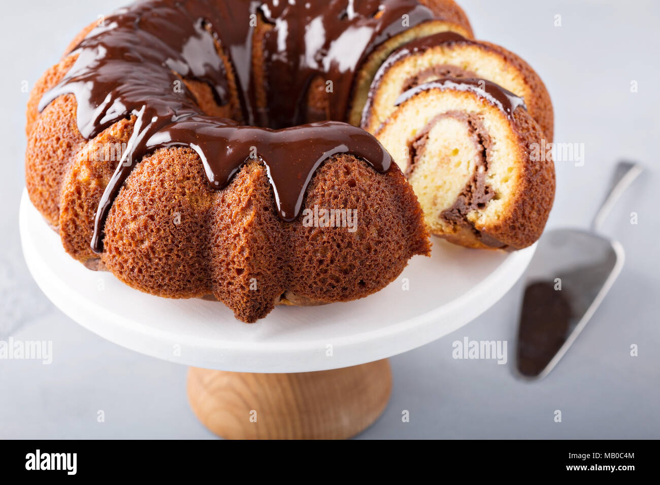Vanilla bundt cake with chocolate cheesecake filling Stock Photo Alamy